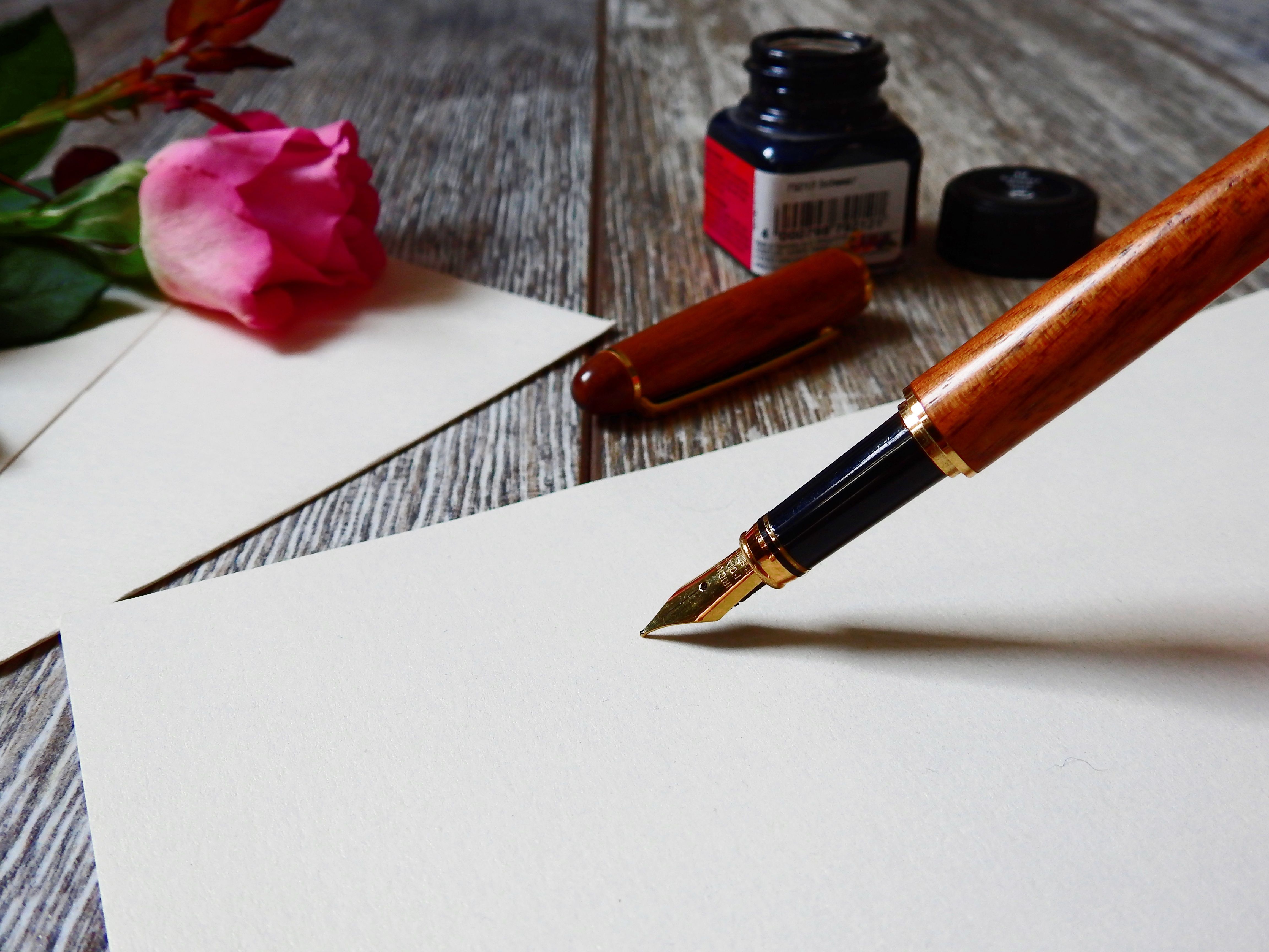 An image of pen and paper