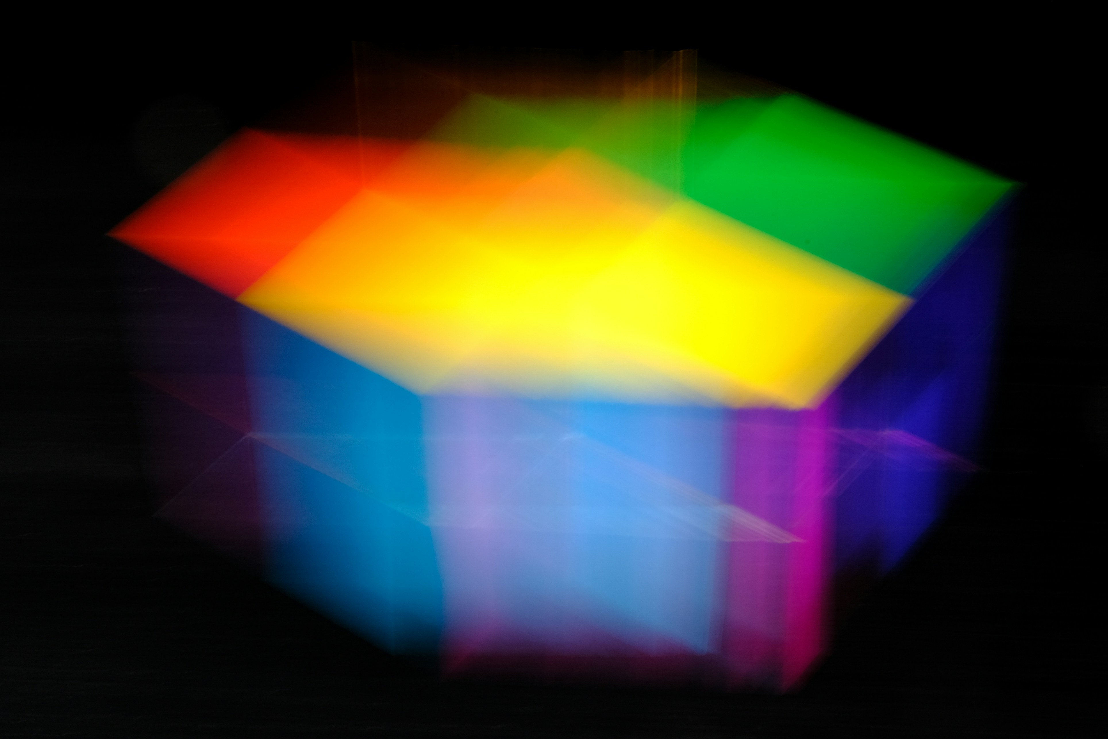 Abstract glowing cube in rainbow colors