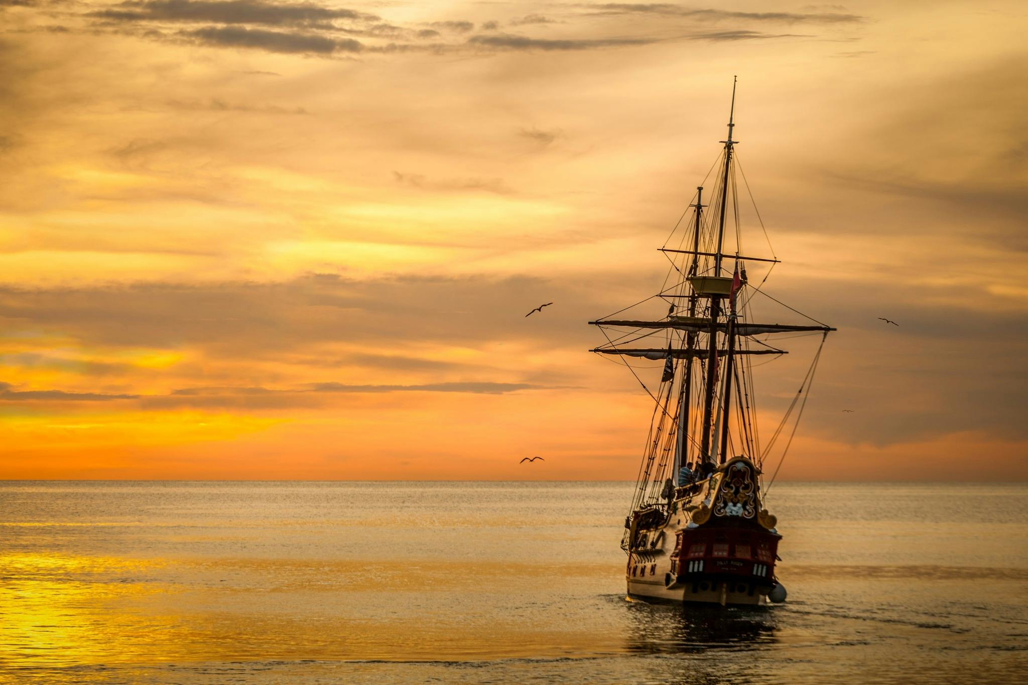 A pirate ship out in the ocean