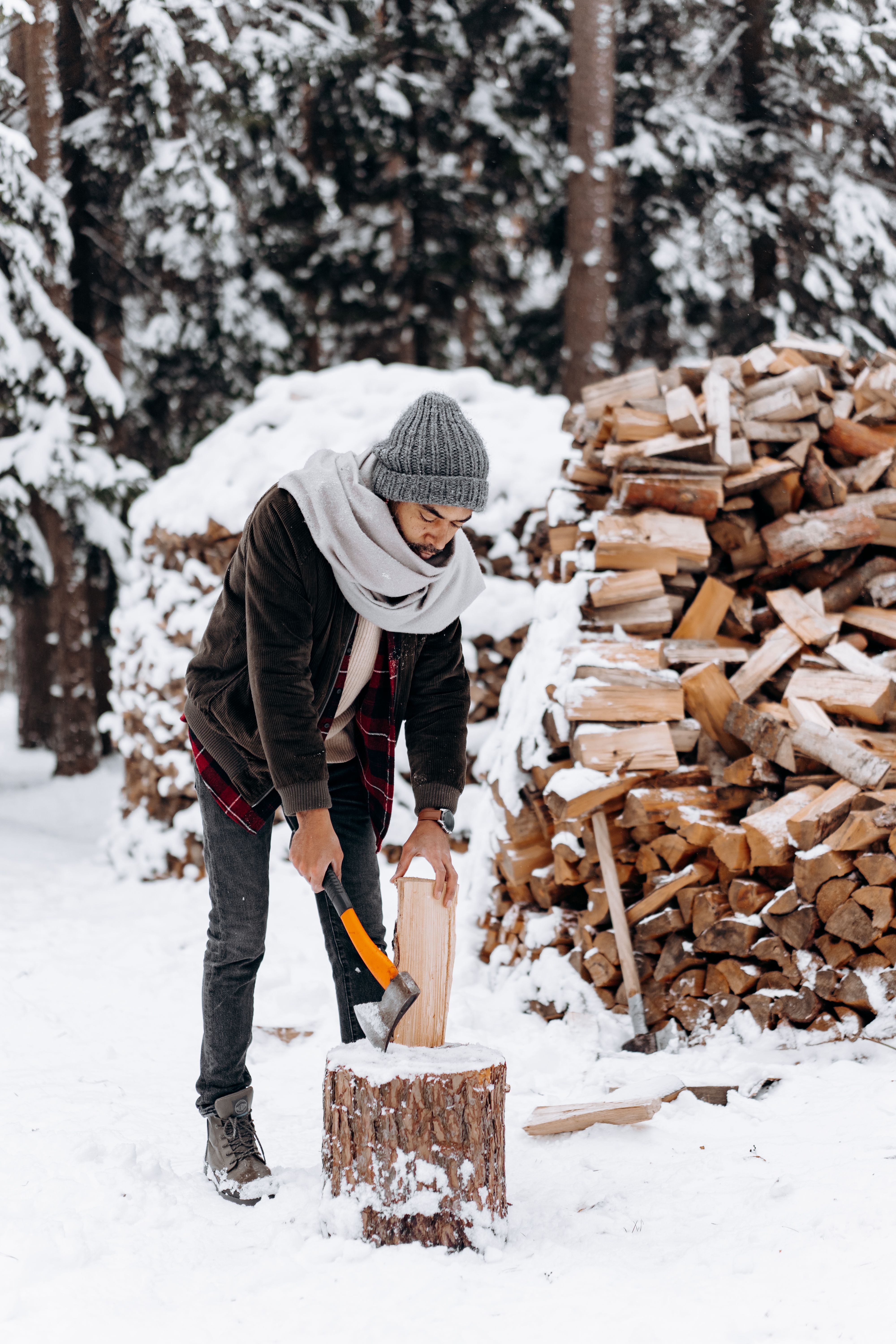Woodsman chopping down wood
