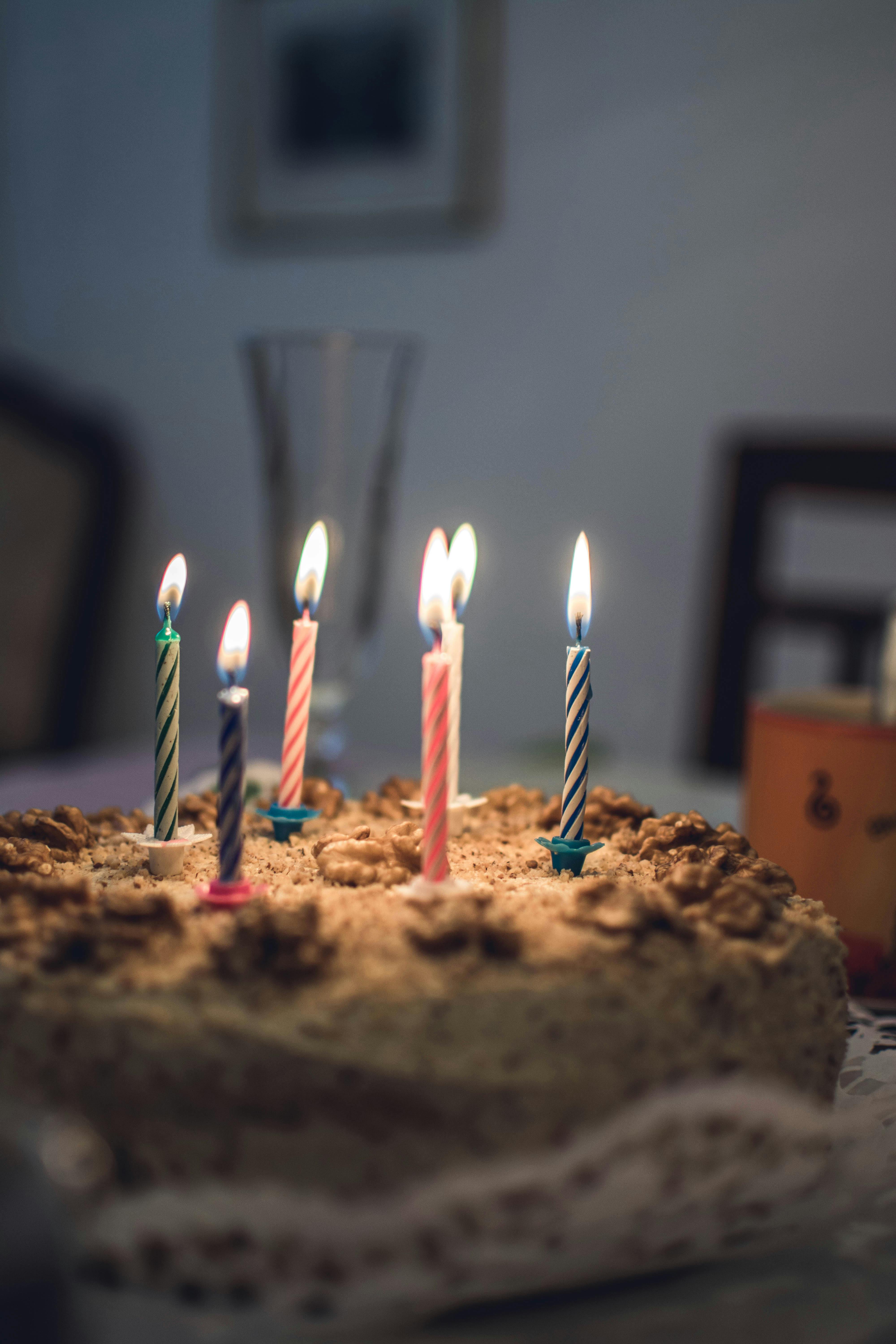 Birthday cake with lit candles